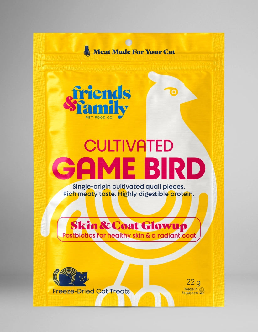Package of freeze-dried cat treats with a yellow background and white bird illustration.
